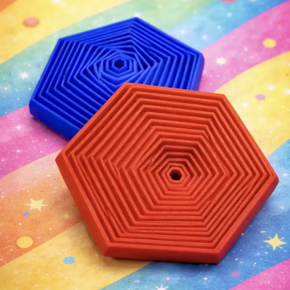 Piezas hexagonales móviles para explorar con los dedos y relajarse.